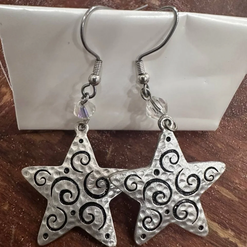 Silver star dangle earrings